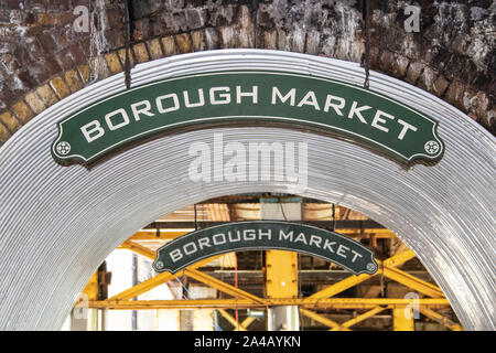 7-24-2019 London UK -Entrance to Borough Market arch with two signs visible Stock Photo