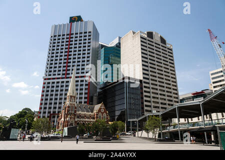 The Uniting Church, a Wesley Church in Albert Street off King George Square, surrounded by modern office towers in Brisbane, Queensland, Australia Stock Photo