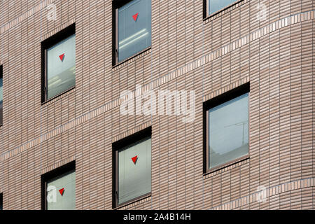 Brickwork Wall Facade With Rescue Windows. Special Red Triangle Sign For Firefighters Are On The Elevation. Stock Photo