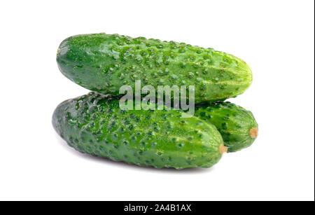 Small pile of cucumbers isolated on white background Stock Photo