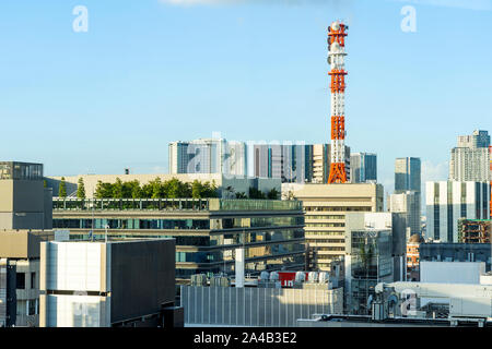 Closeup View of Ordinary City Skyline. Image of Regular Office Buildings and The Antenna on a Rooftop. Stock Photo