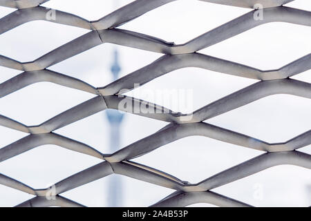 Close-Up View of Expanded Metal Mesh Panels and Blurred Background. Modern Material. Stock Photo
