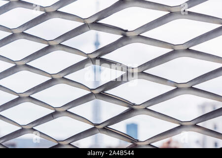 Close-Up View of Expanded Metal Mesh Panels and Blurred Background. Stock Photo