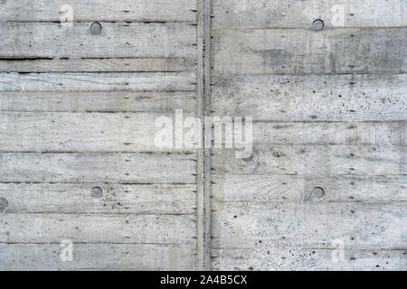 The Texture of Wooden Board Casing Decking of the Concrete Wall. Traces of the Timber Cast Mould for Cement Formwork. Stock Photo