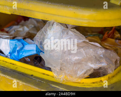 Yellow bin for plastic waste in Germany Stock Photo