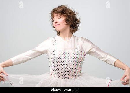 Young funny caucasian woman in costume enjoying the carnival party Stock Photo