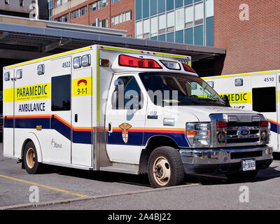 Canadian Ford E450 Paramedic Ambulance in front of the Ottawa Civic Hospital Emergency Department. Ottawa, Ontario, Canada. Stock Photo