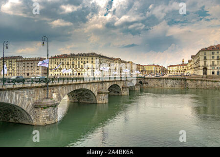 The elegant buildings of Piazza Vittorio Veneto from across the River Po in Turin,Italy