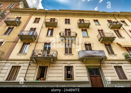 Apartment building with balconies and wooden shutters  on Via Monferrato ,Turin,Italy Stock Photo