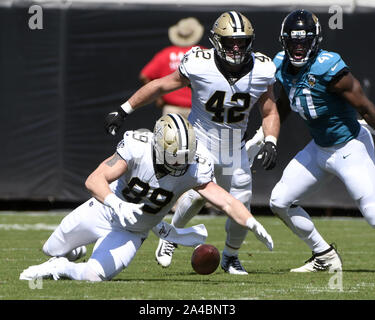 Jacksonville, United States. 13th Oct, 2019. Saints Tight End Josh Hill (89) recovers a fumble during the first quarter as the New Orleans Saints play the Jacksonville Jaguars at the TIAA Bank Field in Jacksonville, Florida on Sunday, October 13, 2019. The Saints defeated Jacksonville 13-6. Photo by Joe Marino/UPI Credit: UPI/Alamy Live News Stock Photo