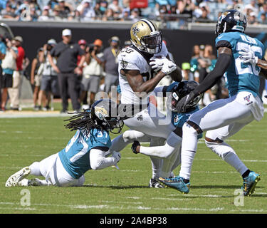 Jacksonville, United States. 13th Oct, 2019. Saints Running Back Latavius Murray(28) is tackled as the New Orleans Saints play the Jacksonville Jaguars at the TIAA Bank Field in Jacksonville, Florida on Sunday, October 13, 2019. The Saints defeated Jacksonville 13-6.Photo by Joe Marino/UPI Credit: UPI/Alamy Live News Stock Photo