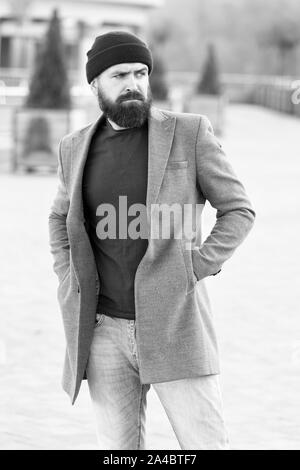 Hipster outfit and hat accessory. Casual outfit spring season. Menswear and  male fashion concept. Man bearded hipster stylish fashionable coat and hat.  Comfortable outfit. Comfortable with his style Stock Photo - Alamy
