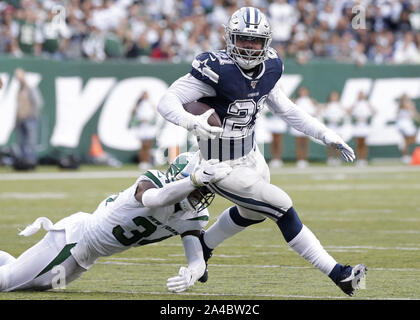 East Rutherford, United States. 13th Oct, 2019. Dallas Cowboys quarterback  Dak Prescott gets sacked by New York Jets Jordan Jenkins in the 4th quarter  in week 6 of the NFL season at