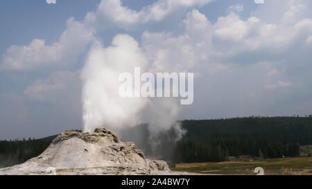 close up of castle geyser erupting in yellowstone Stock Photo