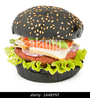 Delicious vegan burger with soy cutlet, tofu cheese and black sesame bun isolated on white background with soft shadow