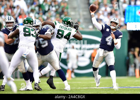 Dallas Cowboys quarterback Dak Prescott (4) in the huddle while on offense  during an NFL game against the Green Bay Packers Sunday, Nov. 13, 2022, in  Green Bay, Wis. (AP Photo/Jeffrey Phelps