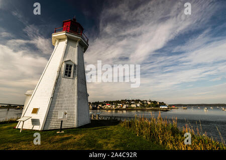 Mulholland Point navigation light and Town of Lubec, Maine   Welshpool, Campobello Island, New Brunswick, CA Stock Photo