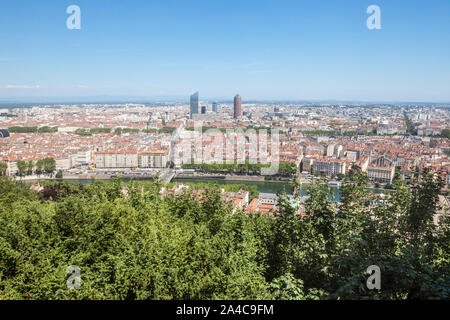 Aerial panoramic view of Lyon with the skyline of Lyon skyscrapers visible in background and Saone river in the foregroud, with the narrow streets of Stock Photo