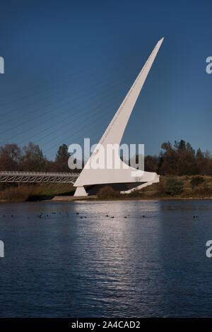 The Sundial Bridge, which crosses the Sacramento River at Turtle Bay in the heart of Redding, California Stock Photo