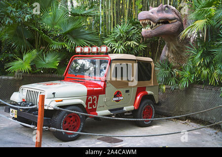 Jurassic Park Dinosaur, Dino T-Rex and Jeep, Islands of Adventure, Universal Studios, Orlando, Florida, USA Stock Photo