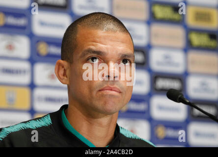 Kiev, Ukraine. 13th Oct, 2019. Portugal player Pepe speaks during a press conference at the NSC Olimpiyskiy stadium in Kiev.Portugal and Ukrainian national teams face in the UEFA Euro 2020 qualifier football match on 14 October 2019. Credit: SOPA Images Limited/Alamy Live News Stock Photo