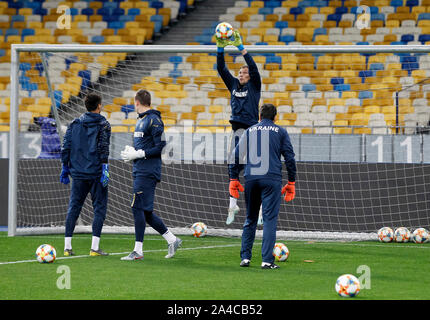 Kiev, Ukraine. 13th Oct, 2019. Goalkeeper Andriy Pyatov (2-R) of Ukrainian team is seen during a training session of Ukrainian team at the NSC Olimpiyskiy stadium in Kiev.Portugal and Ukrainian national teams face in the UEFA Euro 2020 qualifier football match on 14 October 2019. Credit: SOPA Images Limited/Alamy Live News Stock Photo