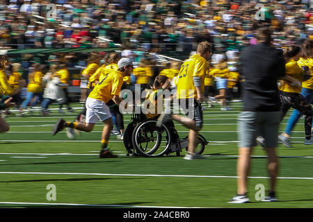 Waco, Texas, USA. 12th Oct, 2019. Baylor Bears fans in action during the game between the Texas Tech Red Raiders and the Baylor Bears at the McLane Stadium in Waco, Texas. Credit: Dan Wozniak/ZUMA Wire/Alamy Live News Stock Photo