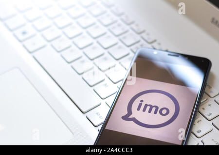 In this photo illustration the imo chat logo is seen displayed on a smartphone. Stock Photo