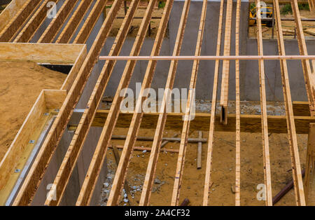 House framing floor construction showing massive solid wood joists trusses Stock Photo