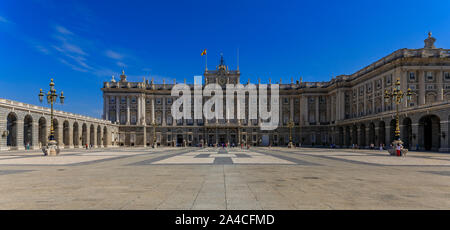 Madrid, Spain - June 4th, 2017: Panoramic view of the ornate baroque architecture of the Royal Palace or Palacio Real and Plaza de la Armeria Stock Photo