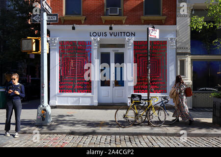 Louis Vuitton, 116 Greene Street, New York, NY. exterior storefront of a french luxury goods store in the SoHo neighborhood of Manhattan. Stock Photo