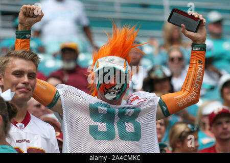 Sunday, October 3, 2019; Miami Gardens, FL USA; A general overall view of  the fifty-yard flag on the field and on the scoreboard during the National  Anthem prior to an NFL game