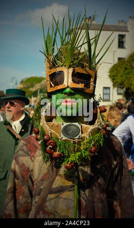 Jack in the Green, also known as Jack o' the Green, is an English folk custom associated with the celebration of May Day in Hastings, UK. It involves a pyramidal or conical wicker or wooden framework that is decorated with foliage being worn by a person as part of a procession, often accompanied by musicians. Stock Photo