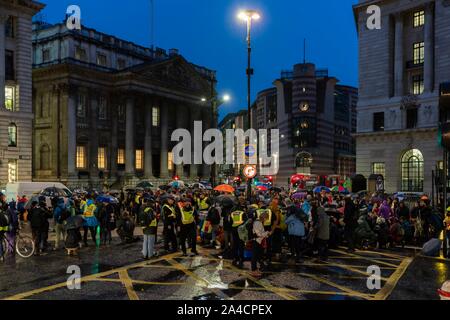 London, UK. 14th Oct, 2019. Extinction Rebellion protesters at Bank junction, City of London, London, UK. Credit: Vladimir Morozov/akxmedia. Stock Photo