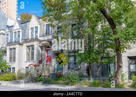 Montreal, typical victorian house with exterior staircase in the Plateau Mont-Royal district in autumn Stock Photo