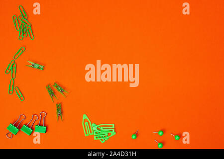 Educational composition, stationery. Green stationery on a black background. Flat lay, top view, copy space Stock Photo