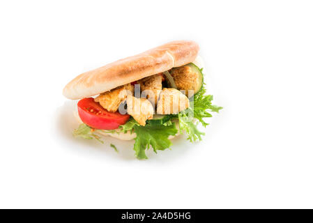 Chicken Tikka Naan Sandwich. Indian Flatbread sandwich with chicken and vegetables, isolated on white, copy space. Stock Photo