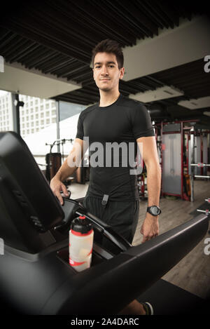 Portrait of a man on a treadmill Stock Photo