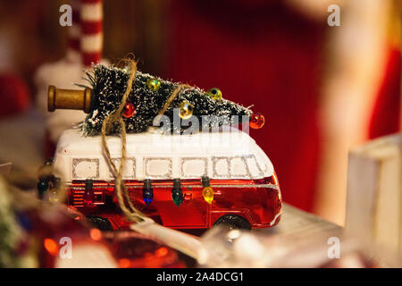 nice Christmas decoration in the shape of an old van with a tree on the roof Stock Photo