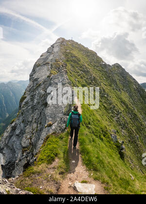 Woman hiking in the mountains, Austrian Alps, Bad Gastein, Salzburg, Austria