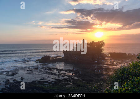 Beautiful Sunset View of Tanah Lot Temple in Bali Island Stock Photo