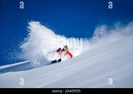 Woman Backcountry Powder Skiing in Bad Gastein, Salzburg, Austria Stock Photo