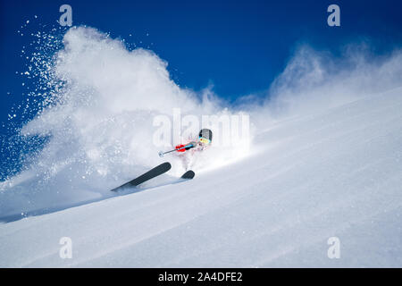 Woman Backcountry Powder Skiing in Bad Gastein, Salzburg, Austria Stock Photo