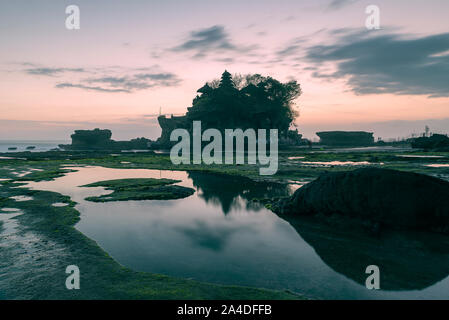 Beautiful Sunset View of Tanah Lot Temple in Bali Island Stock Photo