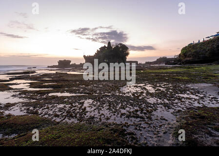 Beautiful Sunset View of Tanah Lot Temple in Bali Island Stock Photo