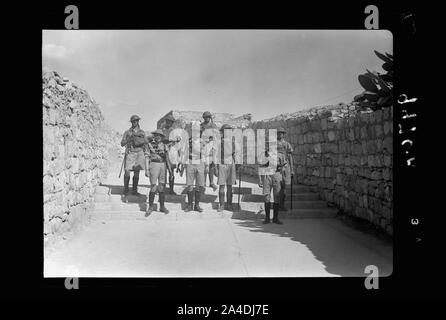 The raising of the siege of Jerusalem. Typical scene of troops in Old City before the lifting of curfew, troops descending the stairs Stock Photo