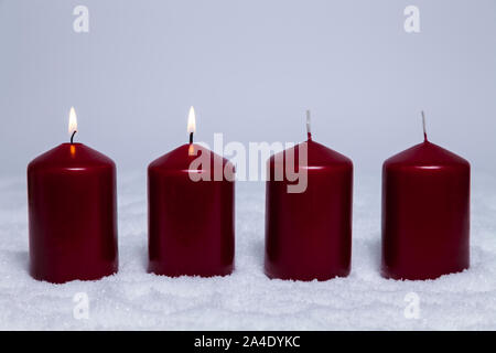 2. Advent with two burning candles in snow Stock Photo
