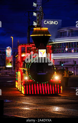 An illuminated Blackpool Tram at South Shore by The Pleasure Beach ready for a tour of the Illuminations. Stock Photo