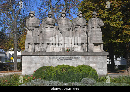 Worms, Germany - October 2019: Stone war memorial depicting five soldiers dedicated to Infantry Regiment 'Prince Carl' No.118 in city of Worms Stock Photo