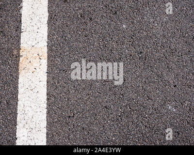 white lines with dark asphalt road Stock Photo
